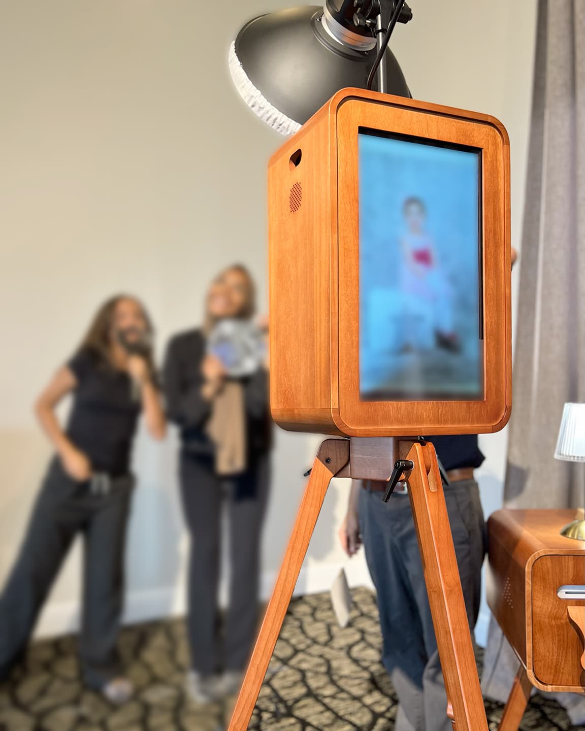 Guests enjoying the Firstlight photobooth during an event
