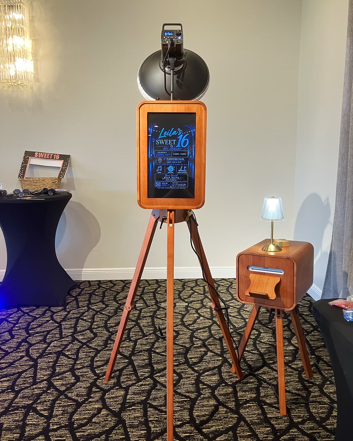 Tampa Sweet 16 photo booth setup with custom branded screen display